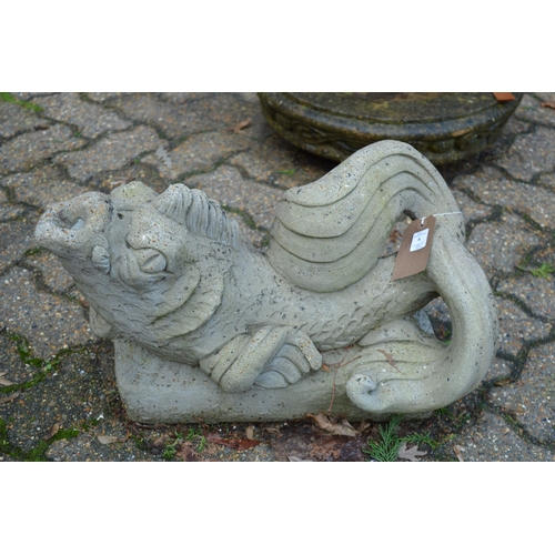 4 - A pair of reconstituted stone dolphin fountains.