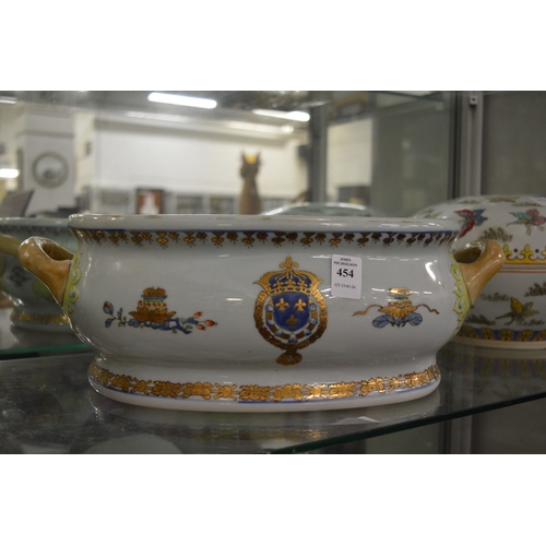 454 - A reproduction Chinese armorial foot bath or jardiniere.