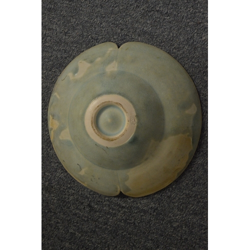 467 - A Chinese celadon glazed lobed circular dish.