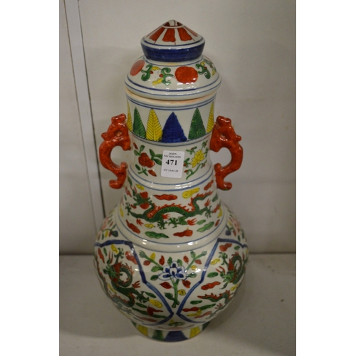 471 - A large Chinese polychrome decorated baluster shaped vase and cover.