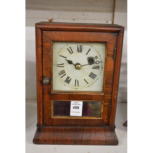 488 - A small rosewood cased mantle clock.