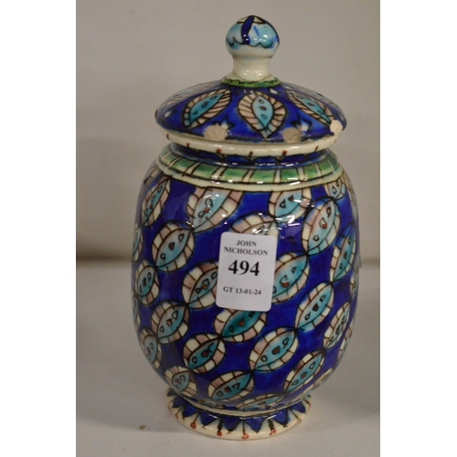 494 - An Iznik style jar and cover.