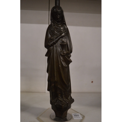 504 - A cast bronze figure of a penitent lady.