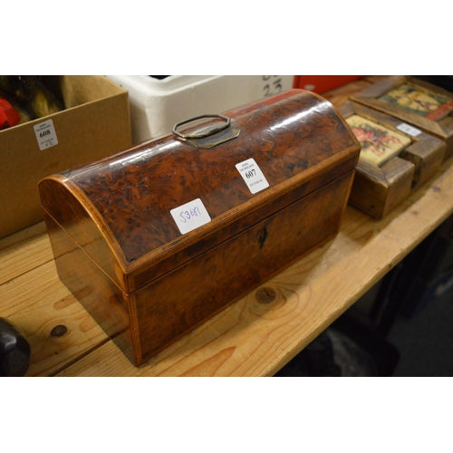 607 - A good George III yew wood dome top tea caddy with fitted interior.