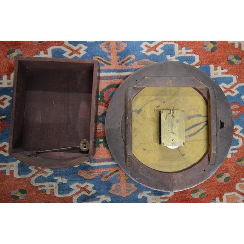 638 - A mahogany cased circular wall clock.