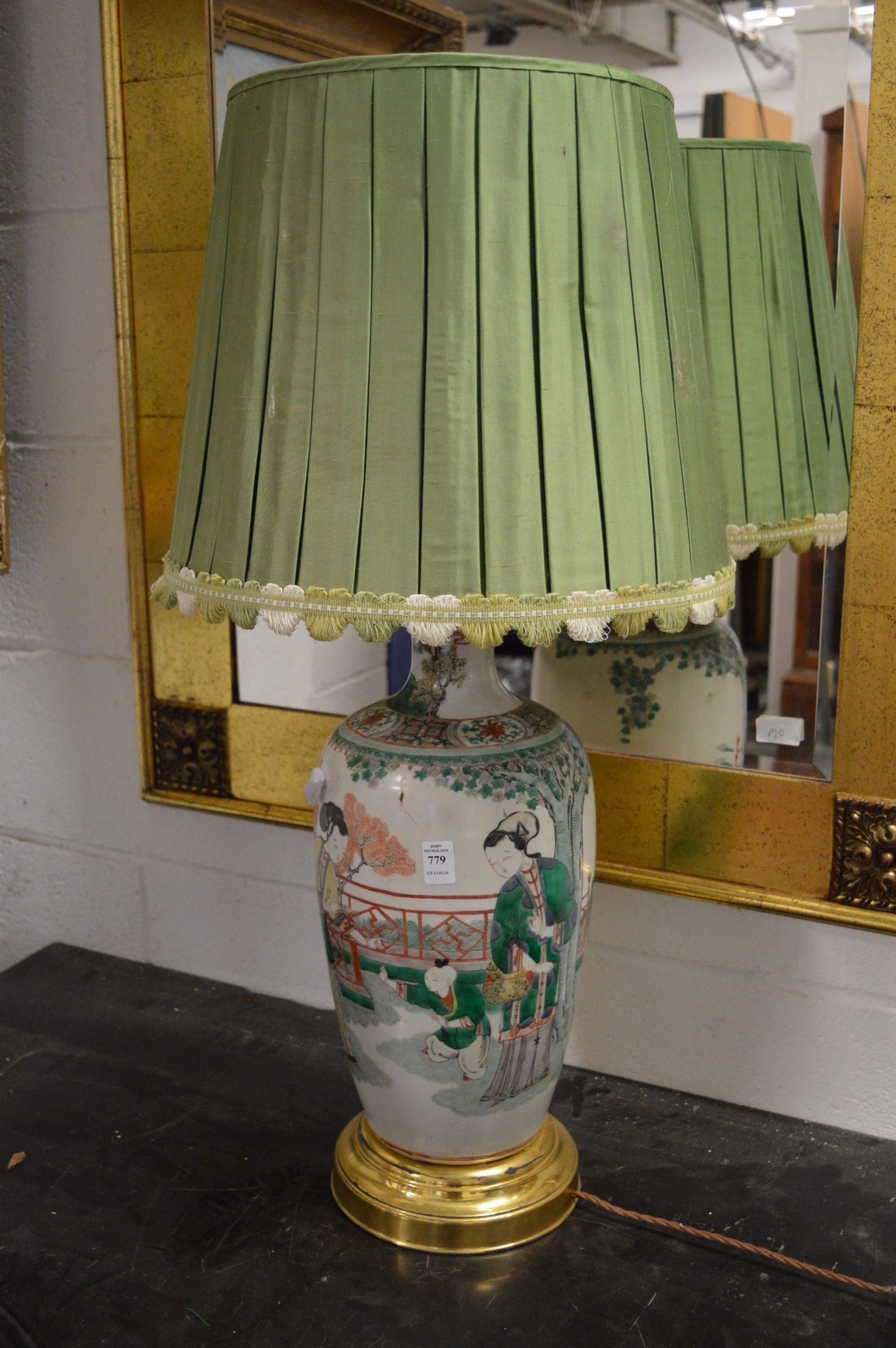 A large Chinese vase lamp.