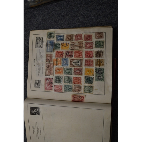 829 - A box of assorted stamp albums and loose stamps.