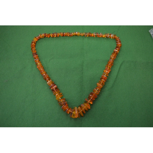 838 - Amber bead necklaces.