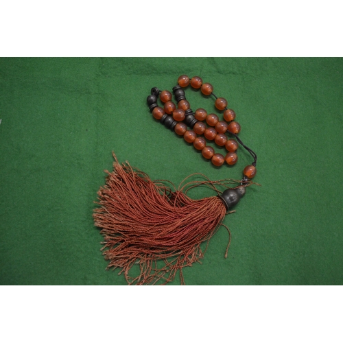 845 - A set of worry beads.