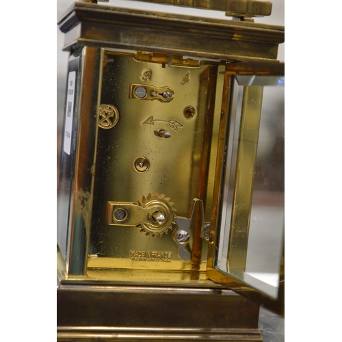 889 - A brass carriage clock.