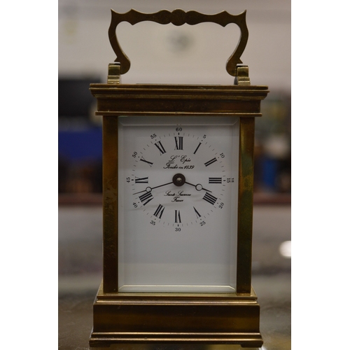 889 - A brass carriage clock.