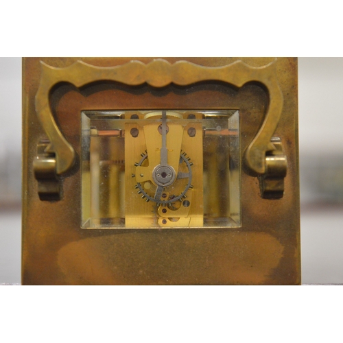 889 - A brass carriage clock.