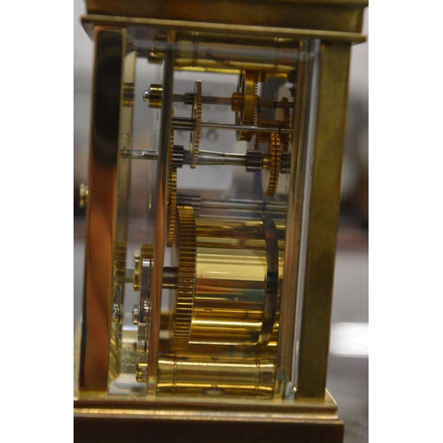 889 - A brass carriage clock.