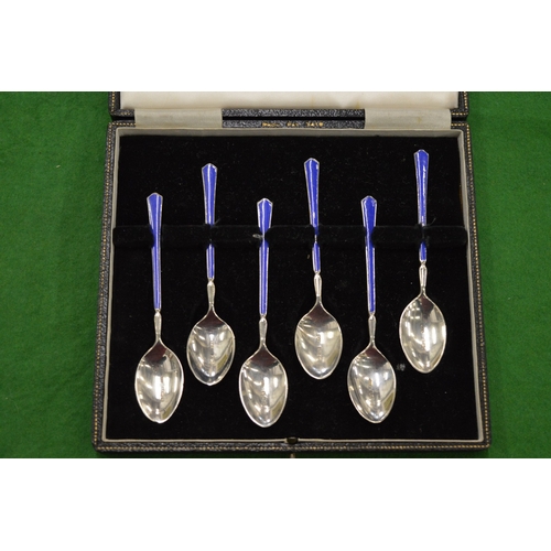 897 - A cased set of six silver and enamel coffee spoons.