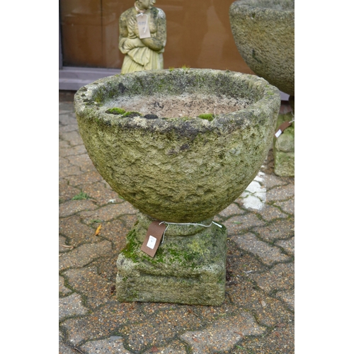 9 - A good pair of weathered reconstituted stone pedestal planters.