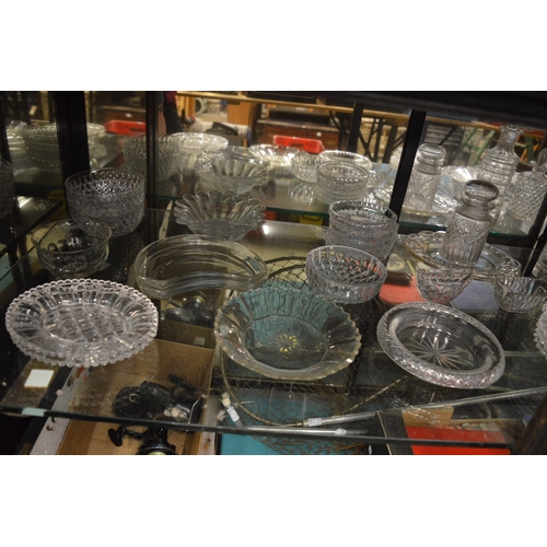 94 - A good collection of cut glassware to include ice plates, dishes, decanters etc.