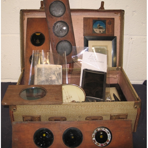 108 - PHOTOGRAPHY: a small suitcase of magic lantern slides, some in wooden frames, four small framed phot... 