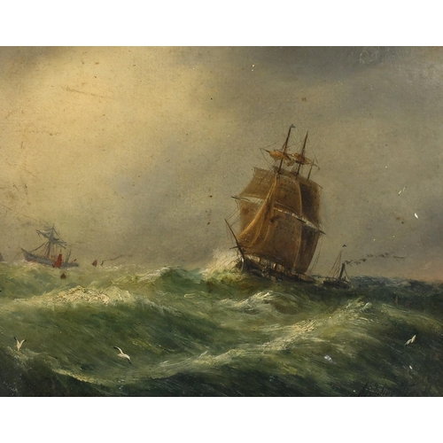 1343 - Adolphus Knell (19th Century), a three masted ship in rolling seas, oil on board, signed, 9