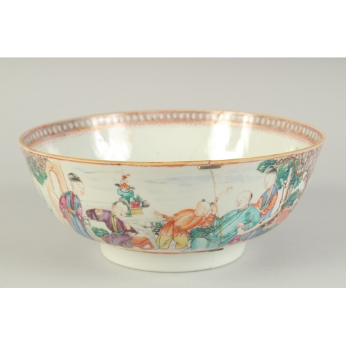 101 - A CHINESE EXPORT FAMILLE ROSE PORCELAIN PUNCH BOWL, the exterior painted with panels of figures, 26c... 