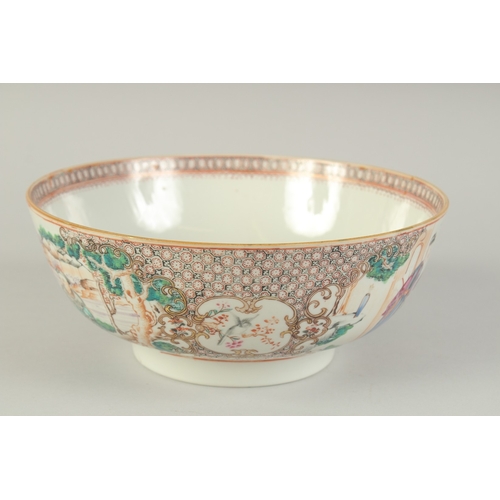 101 - A CHINESE EXPORT FAMILLE ROSE PORCELAIN PUNCH BOWL, the exterior painted with panels of figures, 26c... 
