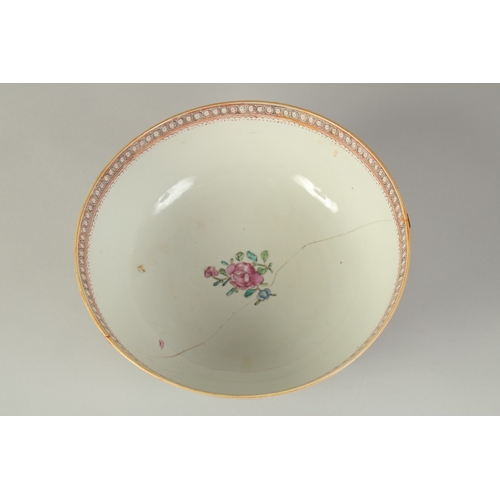 101 - A CHINESE EXPORT FAMILLE ROSE PORCELAIN PUNCH BOWL, the exterior painted with panels of figures, 26c... 