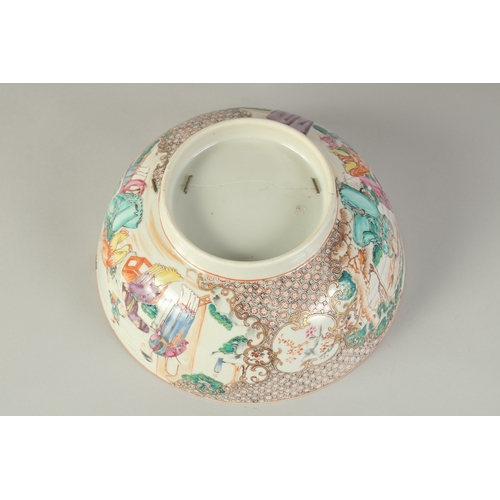 101 - A CHINESE EXPORT FAMILLE ROSE PORCELAIN PUNCH BOWL, the exterior painted with panels of figures, 26c... 
