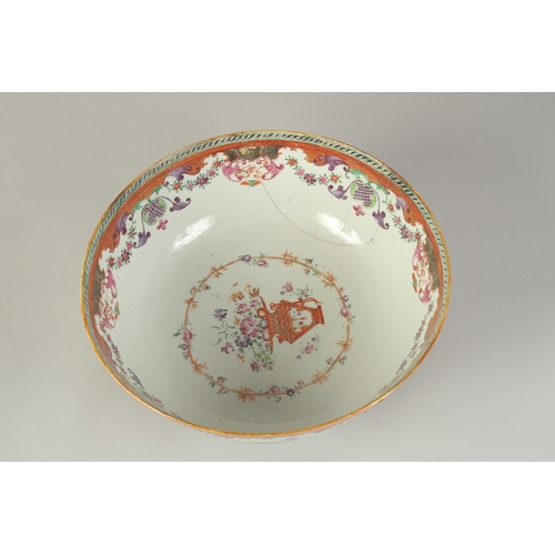 102 - A CHINESE EXPORT FAMILLE ROSE PORCELAIN HUNTING SCENE PUNCH BOWL, painted with European figures on h... 