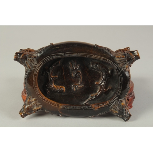 106 - A FINE AND UNUSUAL CHINESE CARVED TIGER'S EYE BRUSH WASHER, on a fitted carved hardwood stand, of ov... 
