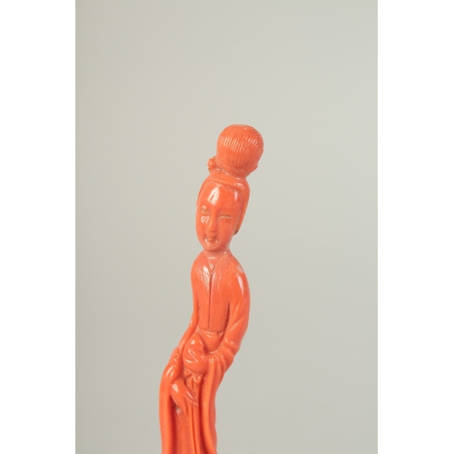 107 - A VERY FINE CHINESE CARVED CORAL FIGURE OF GUANYIN, on stand and in original fitted box with sliding... 