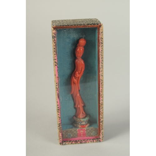 107 - A VERY FINE CHINESE CARVED CORAL FIGURE OF GUANYIN, on stand and in original fitted box with sliding... 