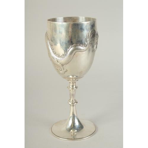 109 - A CHINESE SILVER FOOTED GOBLET CUP WITH EMBOSSED DRAGON, hallmark to base, inscribed to the foot, 23... 
