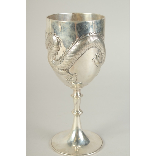 109 - A CHINESE SILVER FOOTED GOBLET CUP WITH EMBOSSED DRAGON, hallmark to base, inscribed to the foot, 23... 