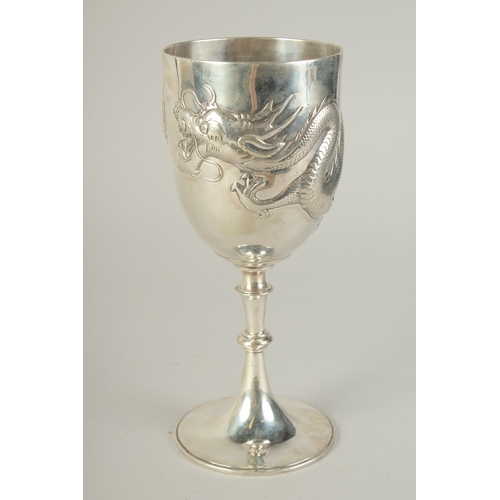 109 - A CHINESE SILVER FOOTED GOBLET CUP WITH EMBOSSED DRAGON, hallmark to base, inscribed to the foot, 23... 