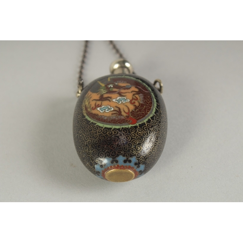 112 - A VERY FINE CLOISONNE ENAMEL DRAGON AND PHOENIX SNUFF BOTTLE, with intricate wirework dragon and pho... 