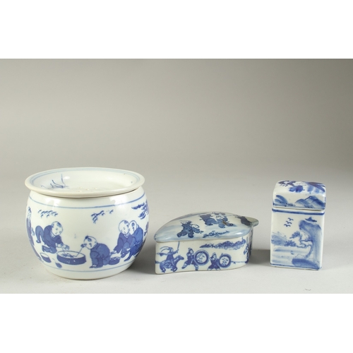 117 - THREE CHINESE BLUE AND WHITE PORCELAIN BOXES, two decorated with boys, the other with landscape scen... 