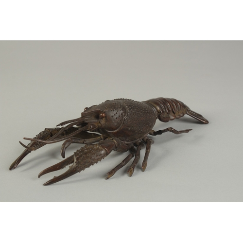 62 - A JAPANESE LIFE-SIZE ARTICULATED BRONZE OKIMONO OF A LOBSTER CRAYFISH, signed, 26cm long.