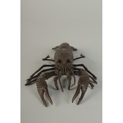62 - A JAPANESE LIFE-SIZE ARTICULATED BRONZE OKIMONO OF A LOBSTER CRAYFISH, signed, 26cm long.