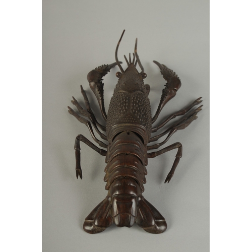 62 - A JAPANESE LIFE-SIZE ARTICULATED BRONZE OKIMONO OF A LOBSTER CRAYFISH, signed, 26cm long.