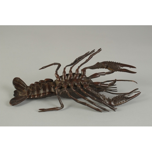 62 - A JAPANESE LIFE-SIZE ARTICULATED BRONZE OKIMONO OF A LOBSTER CRAYFISH, signed, 26cm long.