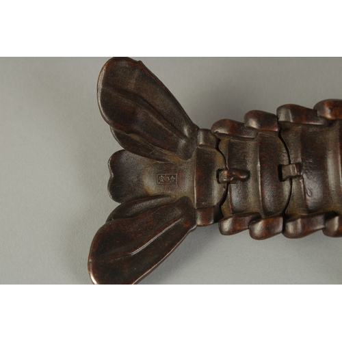 62 - A JAPANESE LIFE-SIZE ARTICULATED BRONZE OKIMONO OF A LOBSTER CRAYFISH, signed, 26cm long.
