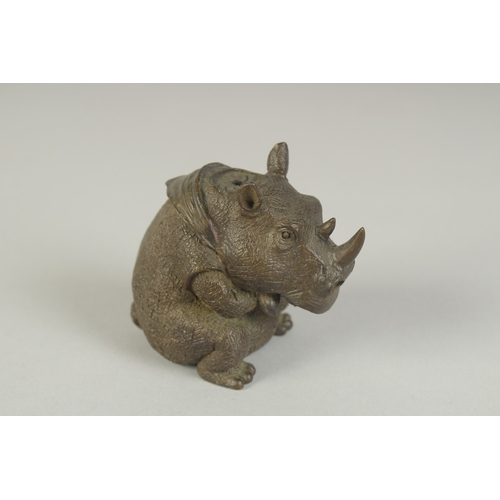 78 - A JAPANESE BRONZE OKIMONO OF A RHINOCEROS, 6.5cm high.