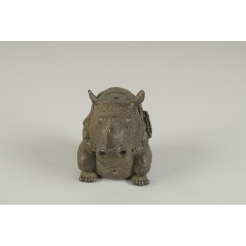 78 - A JAPANESE BRONZE OKIMONO OF A RHINOCEROS, 6.5cm high.