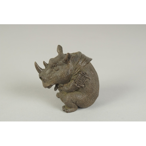 78 - A JAPANESE BRONZE OKIMONO OF A RHINOCEROS, 6.5cm high.