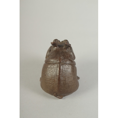 79 - A JAPANESE BRONZE OKIMONO OF A HIPPOPOTAMUS, 6.5cm high.
