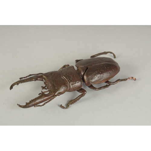 80 - A JAPANESE BRONZE OKIMONO OF A STAG BEETLE, with hinged back opening to reveal inner compartment, 13... 