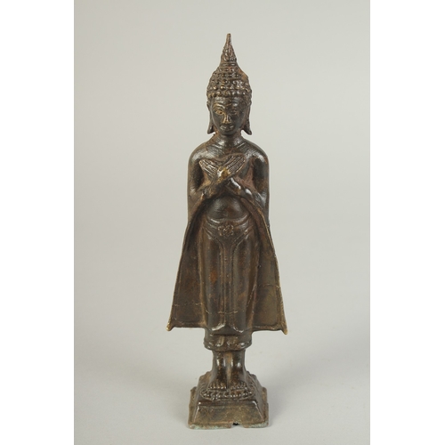 91 - A BRONZE STANDING BUDDHA, 22cm high.