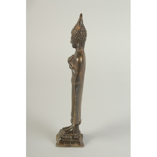 91 - A BRONZE STANDING BUDDHA, 22cm high.