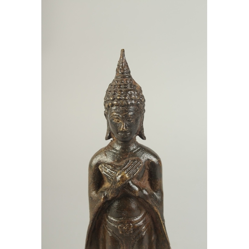 91 - A BRONZE STANDING BUDDHA, 22cm high.