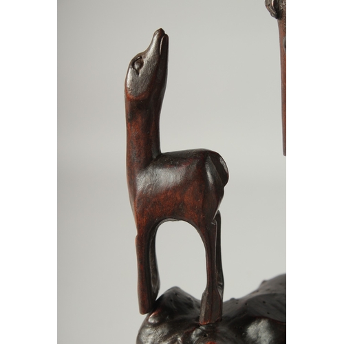 95 - A CHINESE SECTIONAL ROOT WOOD CARVING OF SHOU LAO, 41cm high overall.