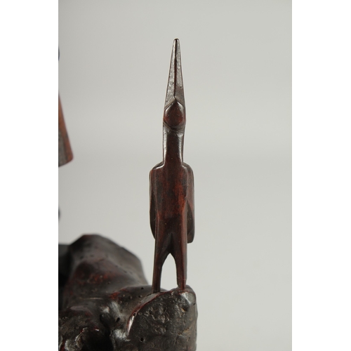 95 - A CHINESE SECTIONAL ROOT WOOD CARVING OF SHOU LAO, 41cm high overall.